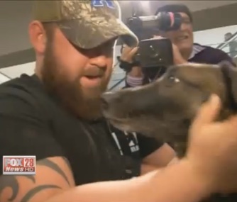 Marine Corporal Seth Hill was reunited with his military working dog Bbazy on Wednesday.