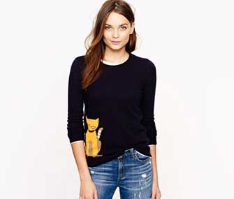 woman wearing a cat sweater