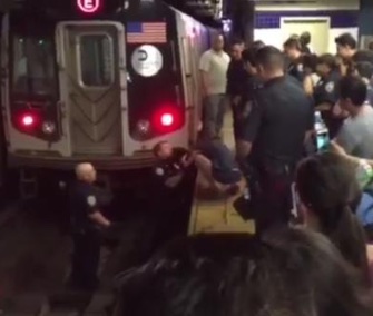 NYPD rescues cat George from subway tracks