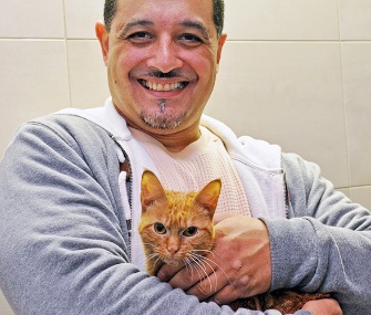 New Yorker Joe R. adopted Baby after helping to save her from a car's engine block.