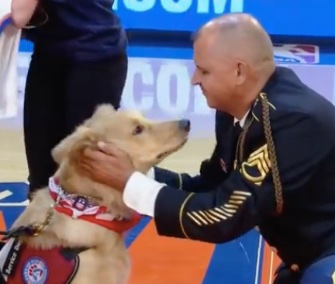 Army Retired Sergeant First Class Luciano Yulfo meets Murphy, his new service dog.