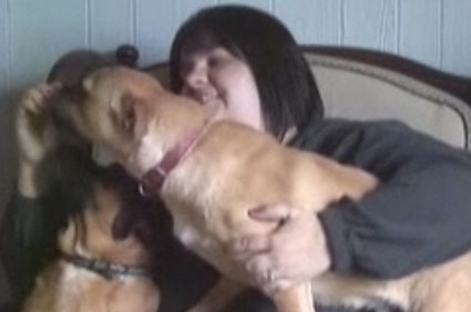 Aimee Ryding with rescue dogs