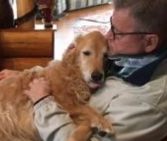Zoey cuddles with her owner after they were reunited this week.