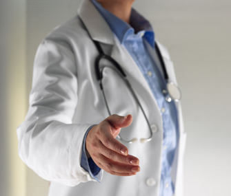 Vet with hand extended