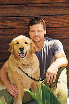 Bailey Chase with his dog, Blue.