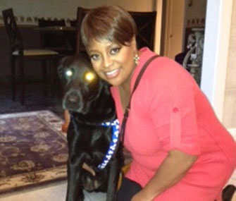 Sherri Shepherd poses with her rescued Lab.