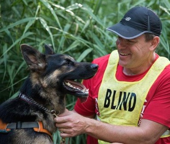 Klinger, a German Shepherd, was trained to be a running guide dog for Richard Hunter, who's blind.