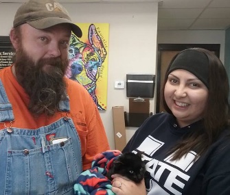 Trash collector Sam McGregor brought Sue the kitten to a local shelter after finding her in the snow.