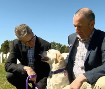 Wearing a purple color for the occasion, Smuckers returned the Purple Heart she found to the daughter of the veteran who earned it.