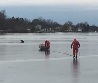 Firefighters helped a 14-year-old Lab off icy Lake Orion in Michigan on New Year's Eve.