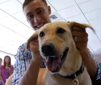 Marine Sgt. Sam Wettstein was reunited with his canine partner Belle Sunday.