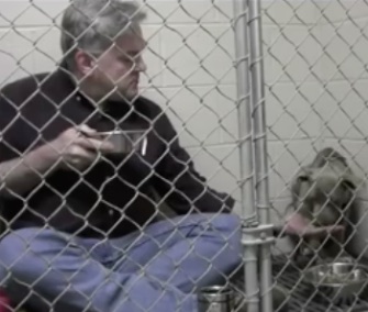 Dr. Andy Mathis climbed into Graycie's cage to comfort her and encourage her to eat breakfast.