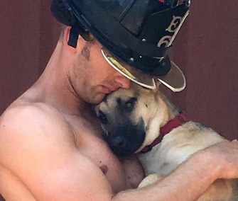 South Carolina firefighter Rob Tackett adopted the shelter puppy he posed with for a charity calendar.