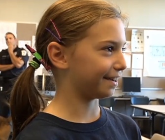 Allison Henry, 10, raised nearly $1,000 to get a bulletproof vest for K9 officer Ryker.