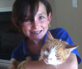 Carlie Sheridan is reunited with her cat, Splash.