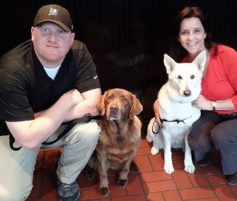Kristen Maurer, right with her dog Roxie, helped reunite Army veteran Jason Bos with his military working dog, Cila.