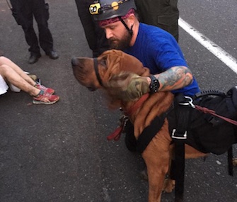 Duke, a young Bloodhound, and his owners were rescued after sliding down a cliff in Oregon.