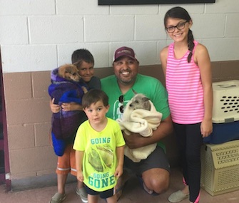 The Montez family was happy to be reunited with Corky, left, and to add Captain, right, to their household.