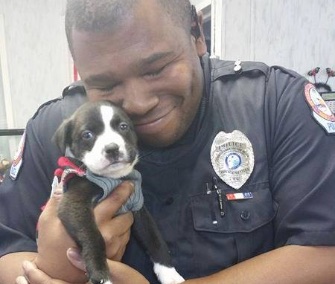 Police Officer Marcus Montgomery fell in love with an adorable puppy he met at a shelter while on a call.