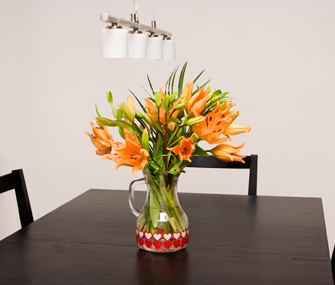 Lillies in a vase on a table