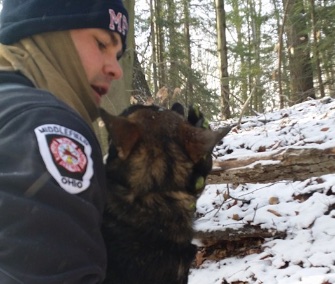 A puppy lost after an accident in Ohio was rescued from a ledge by firefighters.