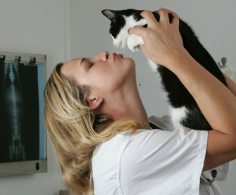 Dr. Patty Khuly holding her cat