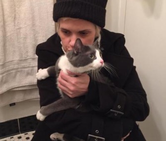 Kathleen Blomberg was reunited with Kitty Cordelia, above, and her other cat, Sebastian, Tuesday.