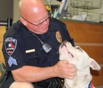 Arlington, Texas, Sgt. Gary Carter has adopted Jeffrey the Pit Bull and named him Chance.