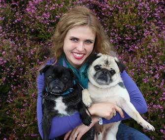 Mikkel Becker and her Pugs, Bruce and Willy
