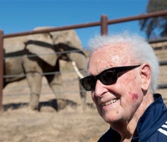 Former game show host Bob Barker visits the three elephants in California on Monday.