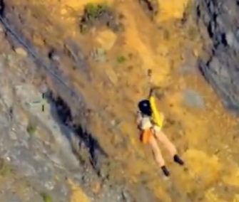 A dog and his owners were saved from a cliff by helicopter at Rodeo Beach, California.