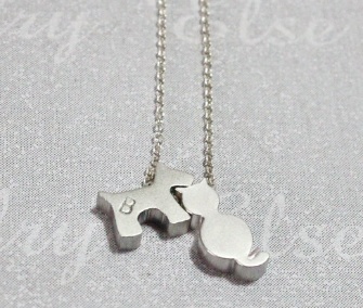 Personalized dog and cat necklace, $29.99 from ElseJewelry on Etsy