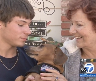 Sean Pyle found his grandmother Mim Needham's dog, Tinkerbell, Sunday in her mud-filled home.