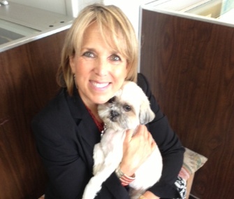 Rep. Michelle Lujan Grisham is happy to be reunited with Kiwi.